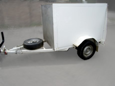 Small covered luggage trailer for hire